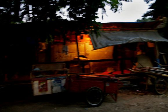Some people build semi-permanent tents along the wall to sleep in. They have to pay illegal rent for this space to a local bureaucrat ciliwung17.jpg